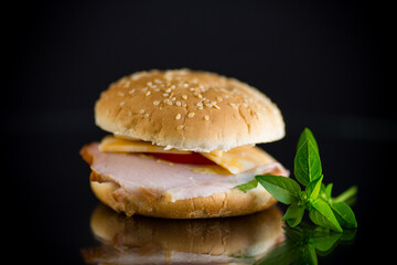 morning sandwich with bacon, cheese and herbs