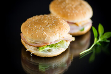 morning sandwich with bacon, cheese and herbs