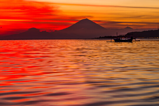 Volcano silhouette at sunset