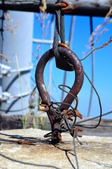 photo of the anchor eye with a steel rope and rope couplings of the mast of the ski lift in the Beskydy Mountains, Pustevny, Beskydy Mountains, Czech Republic