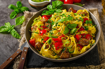 Chinese noodles with pork meat and herbs