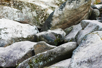lot of stones close-up on beach, pebbles as textured background