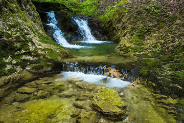 Majestic waterfalls on the stream Gačnik, Soca valley, Slovenia, Europe