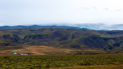 Landscape of glacier of Jökulsárlónwith a farm in the foreground . SuðUrlandsvegur, Kirkjubæjarklaustur in Skaftárhreppur, at South region (ICELAND)