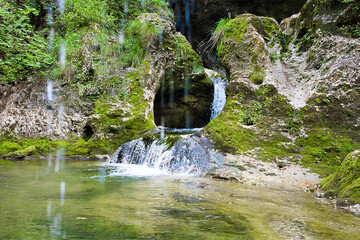 Majestic waterfalls on the stream Gačnik, Soca valley, Slovenia, Europe