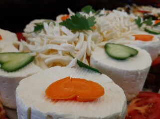 cheese plate served with various cheeses on the table