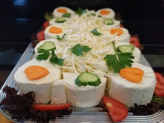 cheese plate served with various cheeses on the table