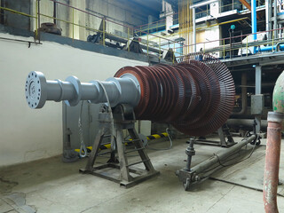 Power generator steam turbine in repair process, machinery, pipes, tubes at power plant