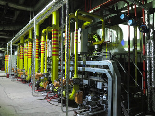 Gas yellow tubes at an thermal electric power plant, night scene