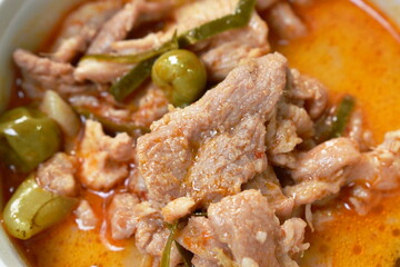  pork curry with eggplant in coconut milk or Panang Thai food on bowl