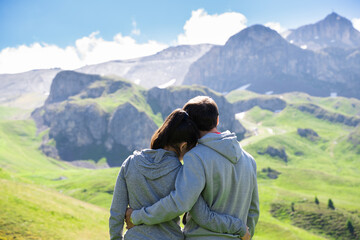 Fototapeta na wymiar Romantic Family Couple In Mountains In Austria