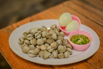 Cooked or Grilled Cockle and Boil egg
