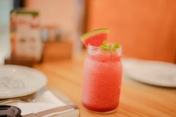 Smoothie water melon with slice water melon selective focus