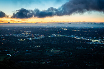 time lapse clouds over the city at night