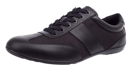 Black leather men's casual shoe isolated on white background, side view