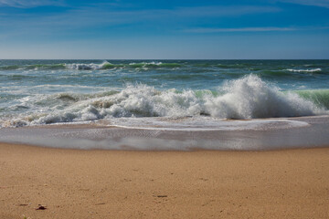 Waves breaking in a beach