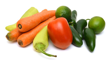 bunch of fresh green chili peppers and vegetable  on a white background