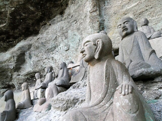 The Hundred-Yard buddha statue carved on a rock cliff in Nokogiri Mountain, Chiba, japan
