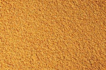 granulated garlic spice on a white background