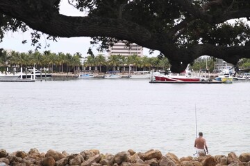 Jupiter Florida lighthouse man fishing 