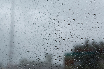 Raindrops over the glass