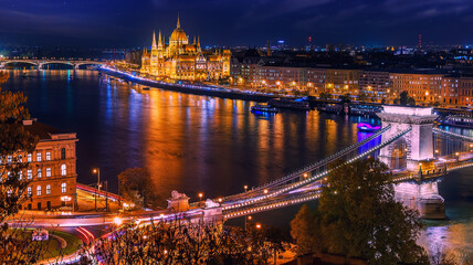Fototapeta na wymiar Beautiful evening image of Budapest, incredible view on Budapest cityscape, with streetlight and colorful sky during sunset. wonderful picturesque Scene. Popular Travel destinations. perfect postcard