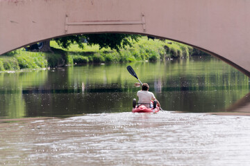 man and woman kayaking