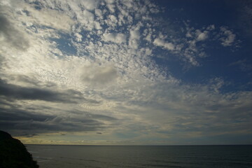 Obraz premium blue sea and cloudy sky over it. Blue Sea sky and Clouds