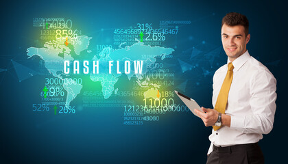 Businessman in front of a decision with CASH FLOW inscription, business concept