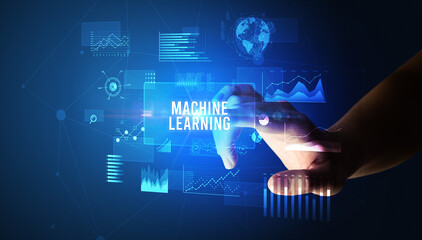 Hand touching MACHINE LEARNING inscription, new business technology concept