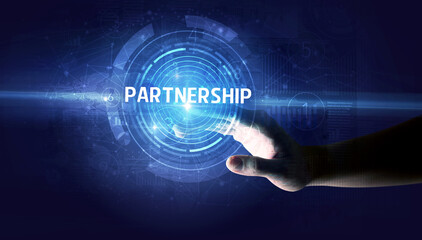 Hand touching PARTNERSHIP button, modern business technology concept