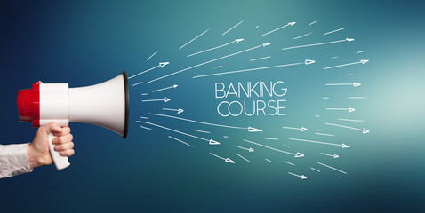 Young girl screaming to megaphone with BANKING COURSE inscription, shopping concept