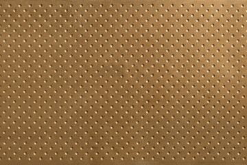 A circular pattern of a metallic texture of an external hard drive as a background.