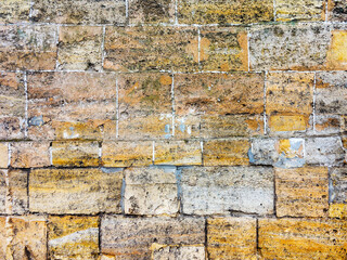 Wall of natural stone as textured background