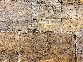 Wall of natural stone as textured background