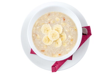 Oatmeal with banana. white background, white dishes