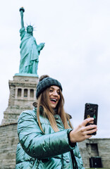 young woman taking picture of herself
