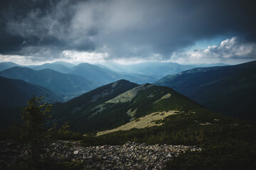 Fototapeta na wymiar green Mountain in Carpatians Ukraine with storm clouds
