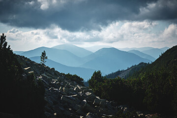 green Mountain in Carpatians Ukraine with storm clouds and rocks