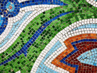 Detail of beautiful old collapsing abstract ceramic mosaic adorned building. Venetian mosaic as decorative background. Selective focus. Abstract Pattern. Abstract mosaic colored ceramic stones