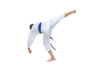 In karategi boy athlete beats kick on white isolated background