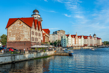 Naklejka premium The Fishing Village, situated on the banks of the River Pregel, recreates a slice of the city's pre-war fishing quarter with a series of cafes, restaurants and lighthouse