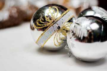 Close-up shot of silver Christmas tree decorations. Christmas Decoration stock photo. Holiday decorations used for hanging on Christmas tree