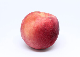 Nectarine fruit isolated on white background. A variation of peach