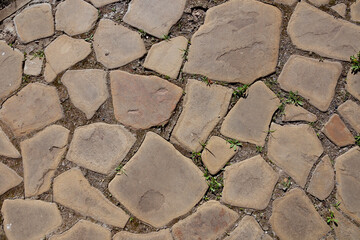 mosaic masonry made of stones or concrete in brown color