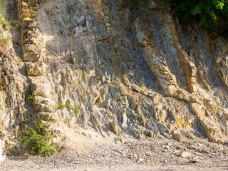 textured background of rock structure. Caucasus Mountains