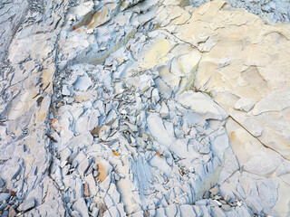 textured background of rock structure. Caucasus Mountains
