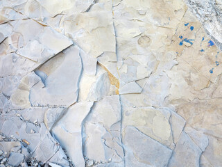 textured background of rock structure. Caucasus Mountains