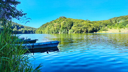 Boat station with lake on background in the summer season