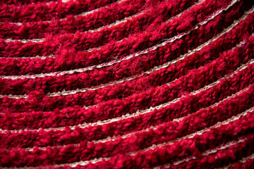 Abstract background of close up a red rug